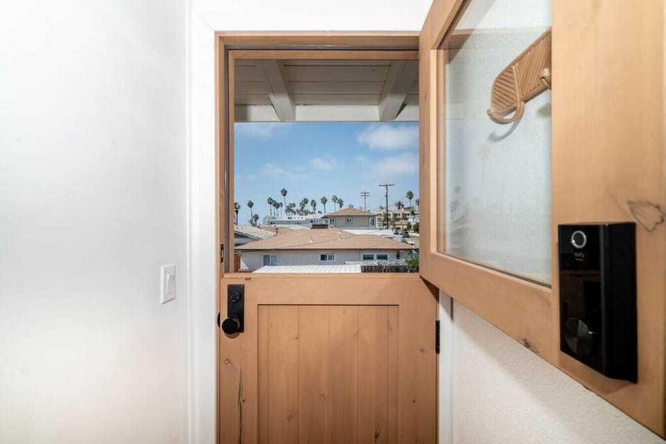 Welcome the ocean breeze with a beautiful Dutch door