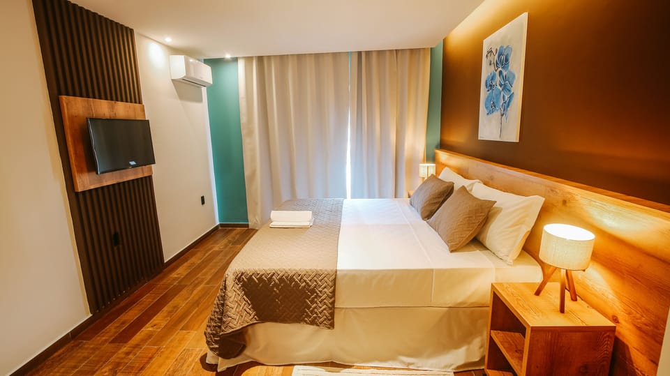 Superior Room, Patio | Minibar, individually decorated, desk, laptop workspace