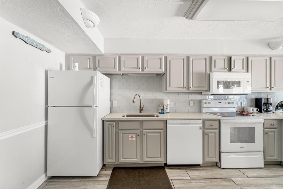 Condo, Multiple Beds (The Summit 1101) | Private kitchen | Oven, toaster
