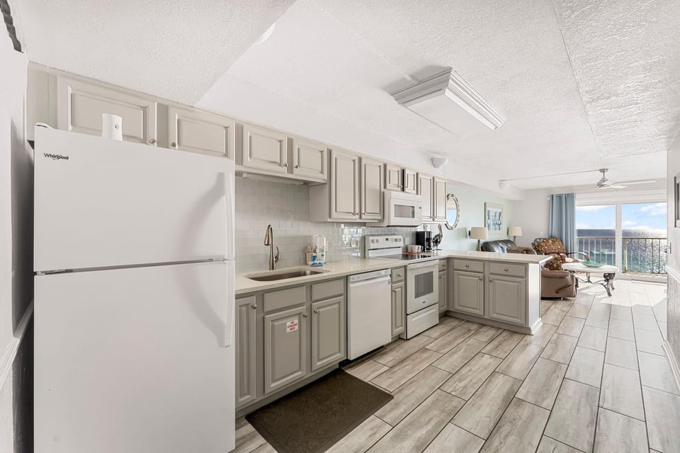 Condo, Multiple Beds (The Summit 1101) | Private kitchen | Oven, toaster