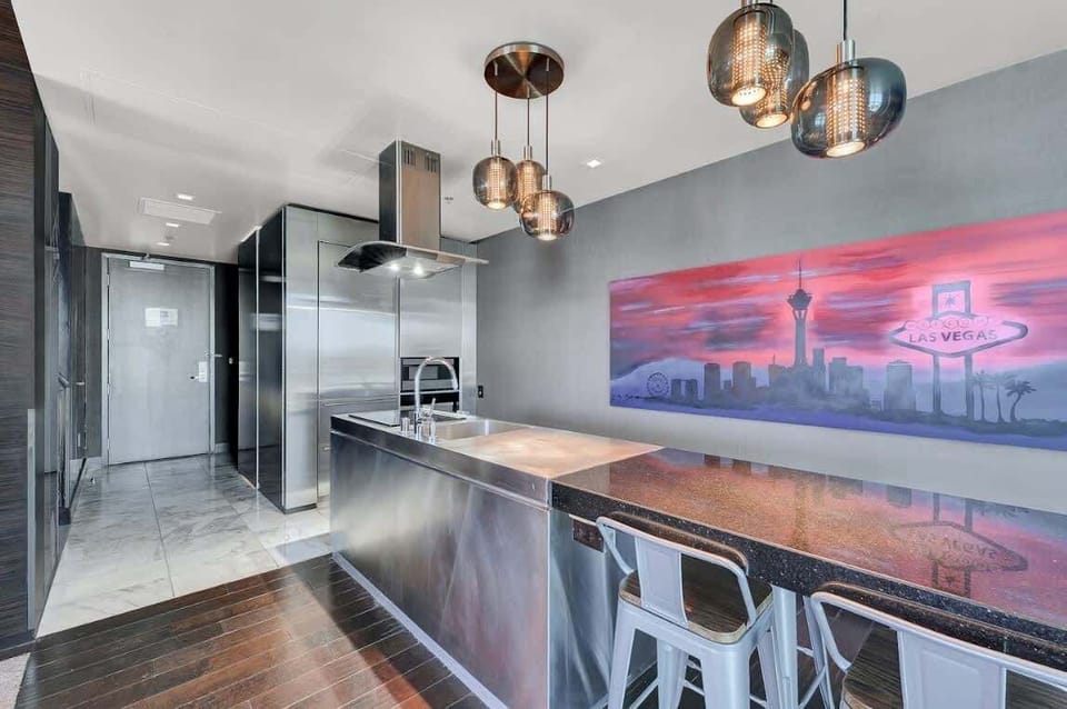 Fully equipped kitchen with quality appliances and complete set of cookware.