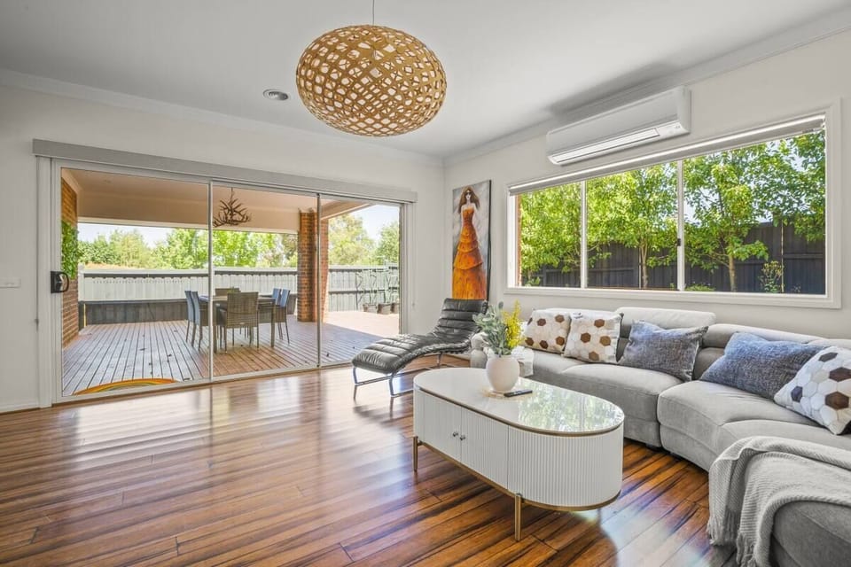 Family House, Garden View | Living area | 55-inch TV with cable channels