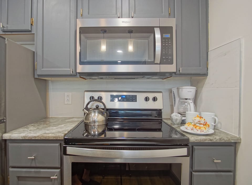 Drip coffee maker and microwave provide in the condo
