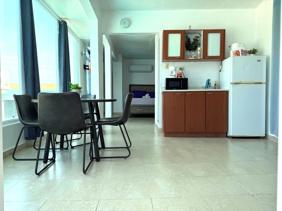 VA 201 Deluxe Views of the Atlantic, Family Suite / Kitchen / 1 Full Size  Bed and 2 Twin/Twin Bunk | Living area | Flat-screen TV
