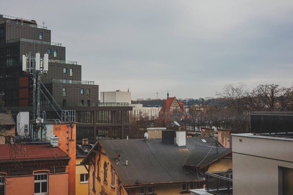 view of the city and opera house from the bedroom
