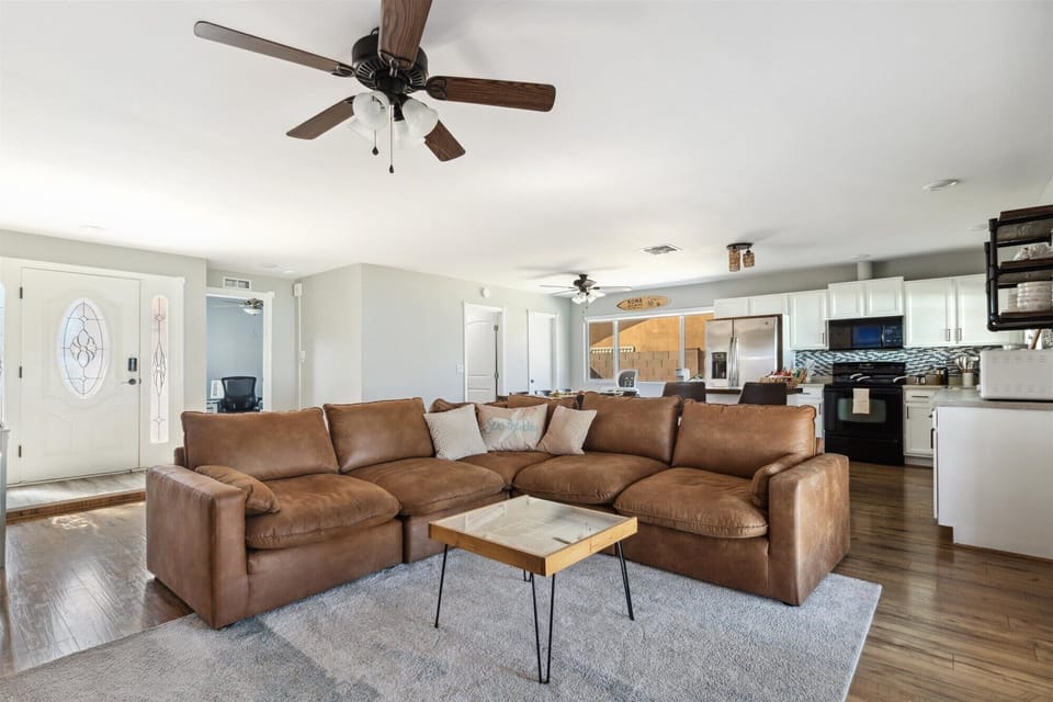 A roomy open-concept kitchen and living area provides plenty of space to gather and entertain.