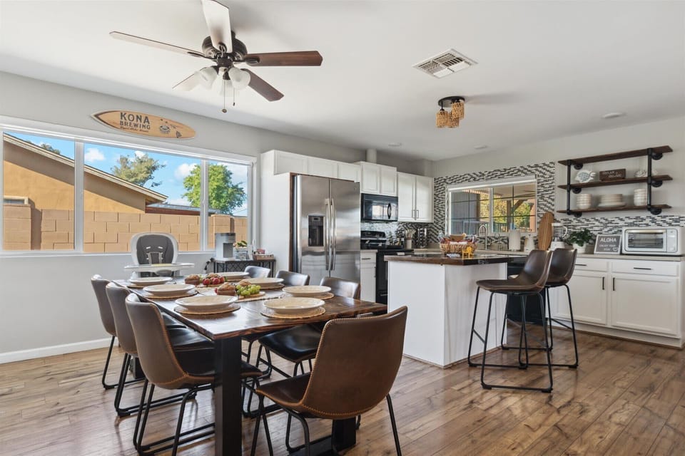 The dining table seats up to 8 people, with a high-chair available upon request.
