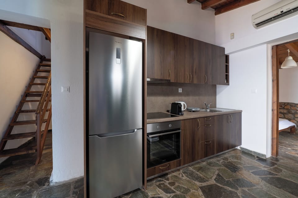 Family Apartment, 2 Bedrooms, Sea View, Poolside | Private kitchen | Coffee/tea maker, mini-fridge, electric kettle, toaster