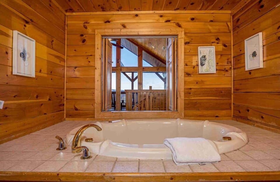 Indulge in a soothing soak in the private indoor jacuzzi tub.