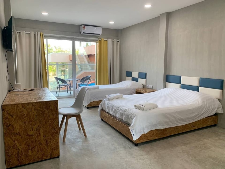 Deluxe Twin Room, Balcony, Resort View | Desk, laptop workspace, iron/ironing board, WiFi (free)
