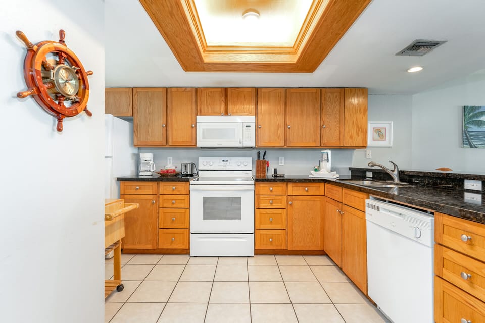 With ample counter space, a convenient breakfast bar, and a wide array of essential appliances and gadgets, cooking a meal has never been this enjoyable.