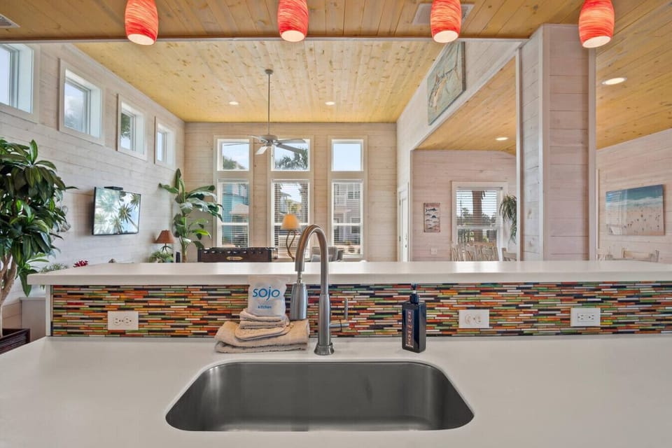 `Enjoy ocean-inspired views right from the kitchen sink!`