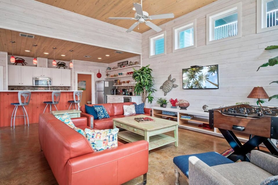 `Gather, relax, and reconnect in this bright and beachy open-concept space.`