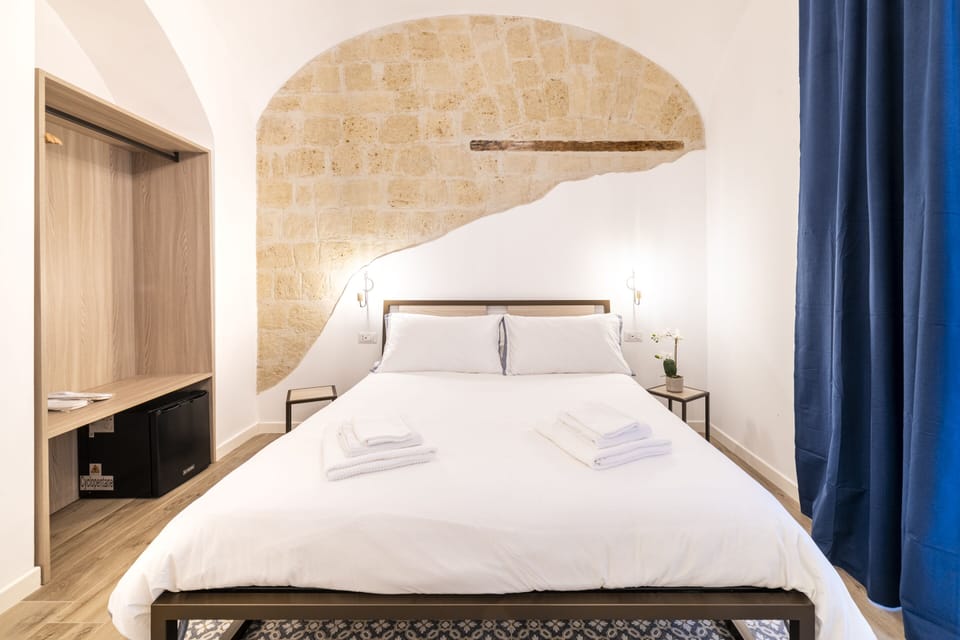 Superior Quadruple Room | Premium bedding, down comforters, in-room safe, individually decorated