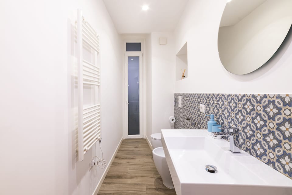 Superior Quadruple Room | Bathroom | Shower, rainfall showerhead, hair dryer, slippers