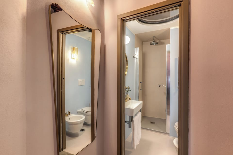 Deluxe Apartment, 2 Bedrooms | Bathroom | Shower, rainfall showerhead, hair dryer, bidet