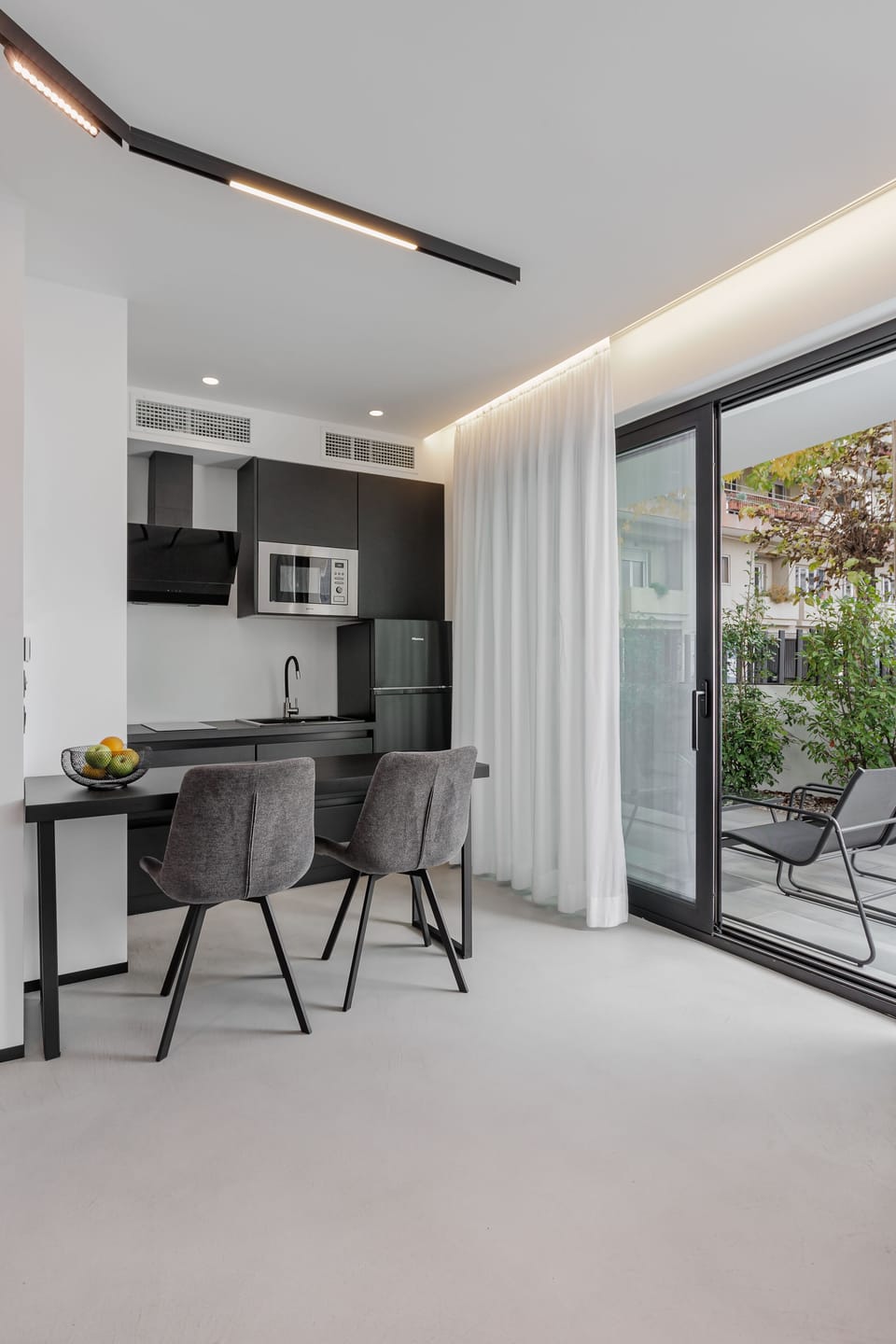 Deluxe Apartment with Private Patio | Private kitchen | Full-size fridge, oven, stovetop, espresso maker