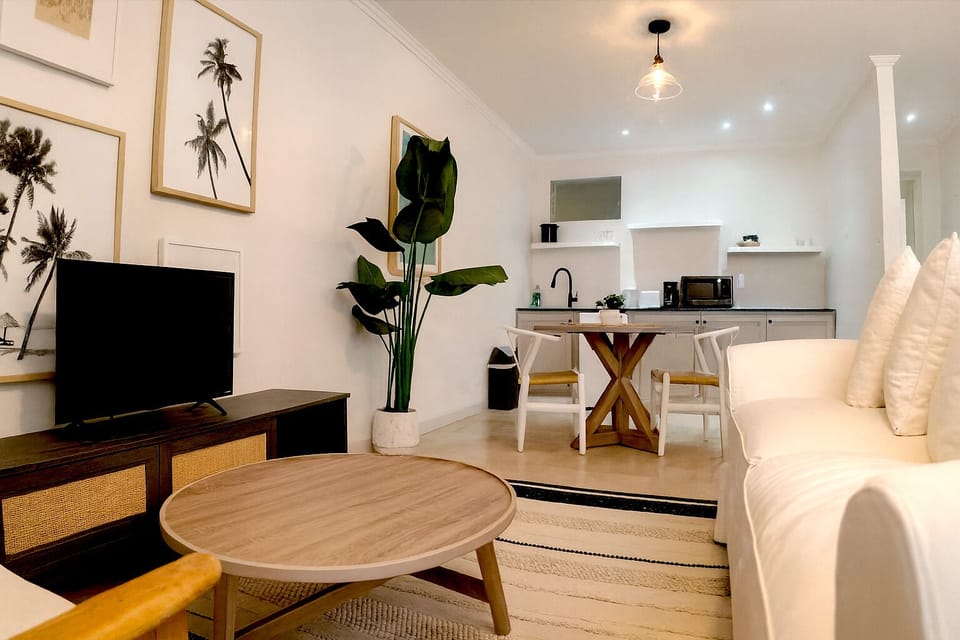 Family Suite, 2 Bedrooms, Garden View | Living area | 32-inch Smart TV with digital channels