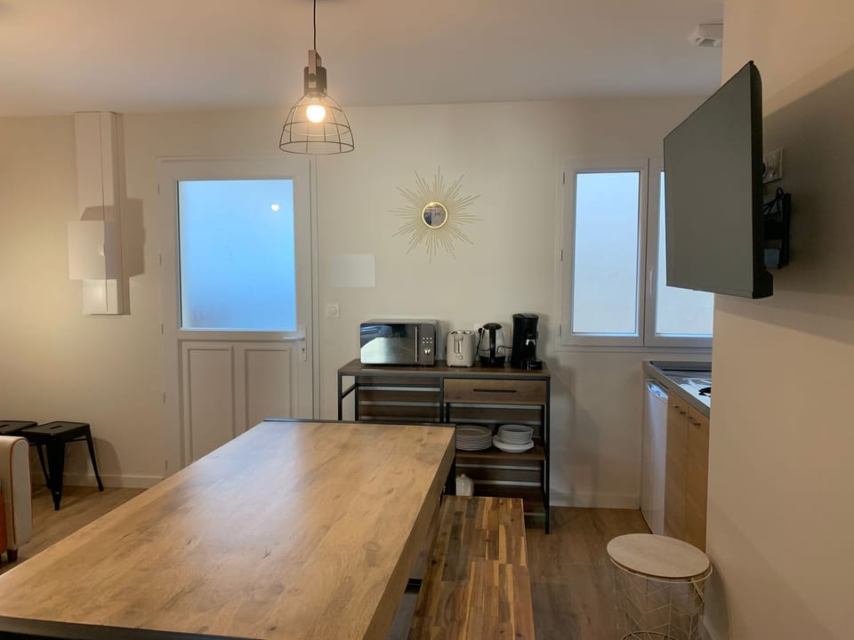 Apartment | Living area | 32-inch flat-screen TV with digital channels