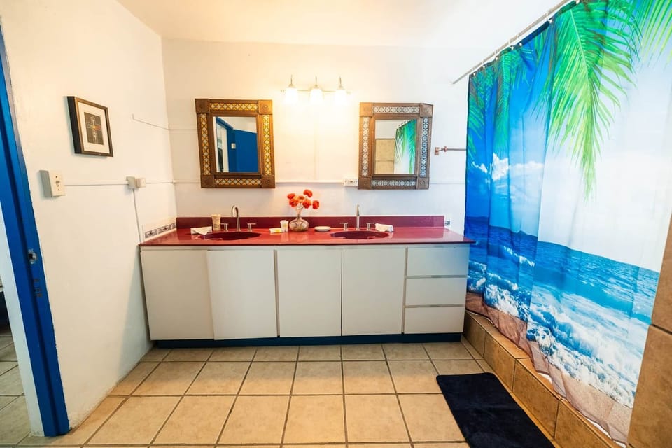 Spacious bathroom with double sinks.