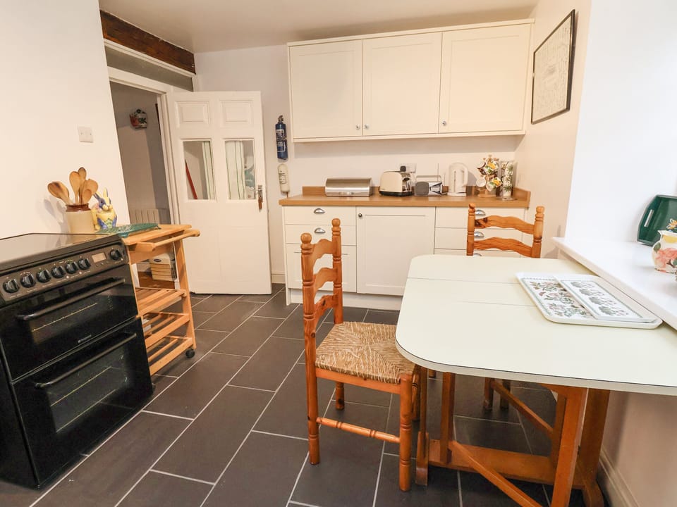 Fridge, electric kettle, toaster, cookware/dishes/utensils