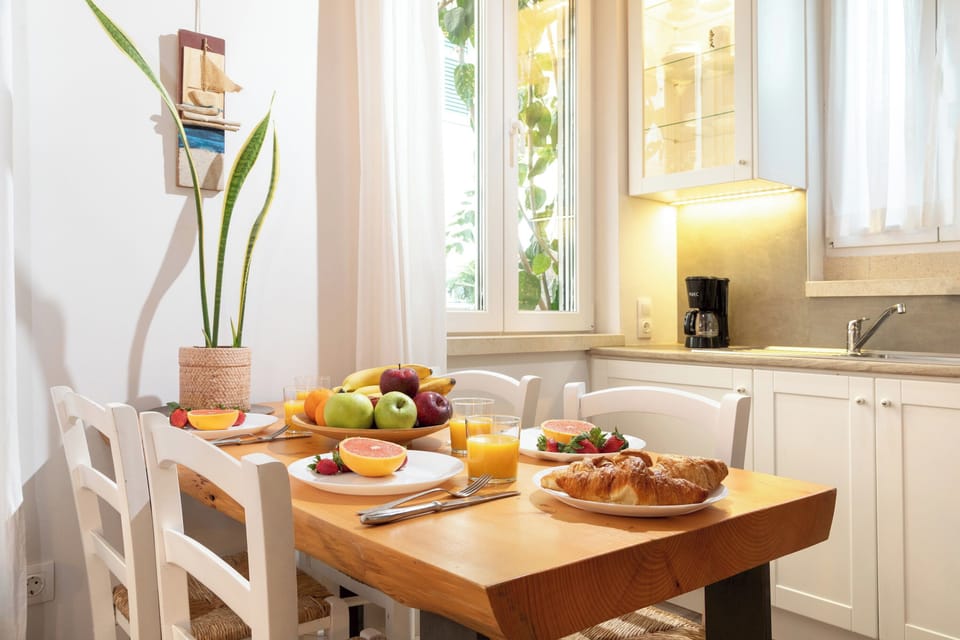 "Gather around our artisanal wooden table, where every meal becomes a cherished moment shared among loved ones."