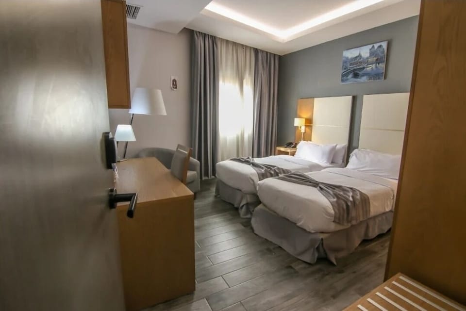 Premium bedding, minibar, laptop workspace, soundproofing