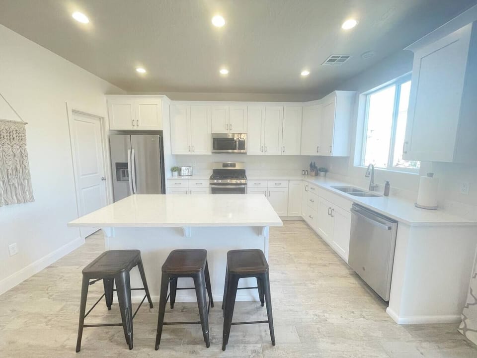 The fully stocked kitchen has everything you will need from pots and pans, baking sheets, to ample dishware.