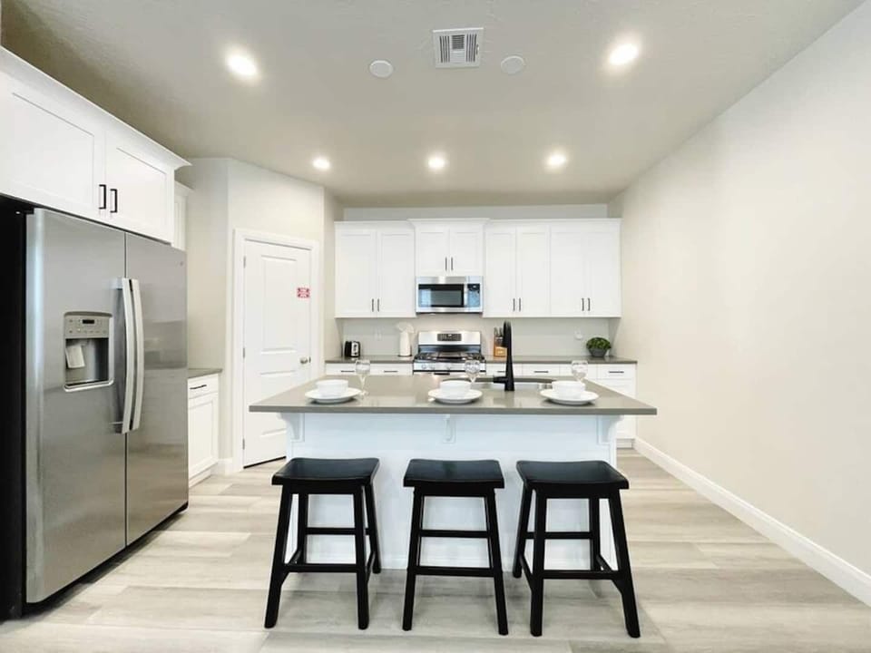 The kitchen lives large with lots of counter space to prepare meals. We have everything you need from pots and pans to cutlery and dishes. 