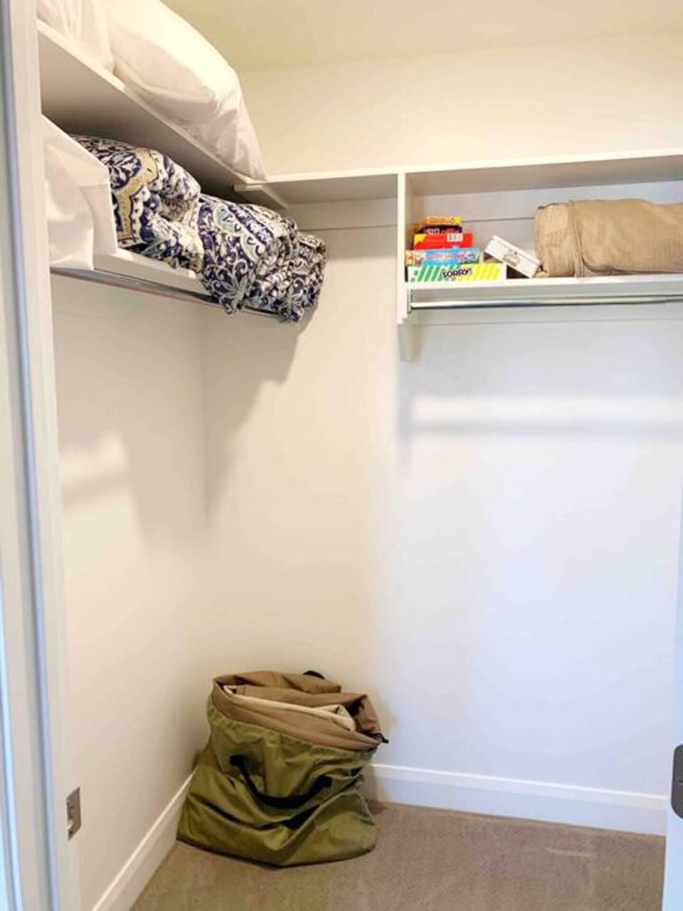Closet in loft with board games, extra bedding and a queen size blow up mattress. 