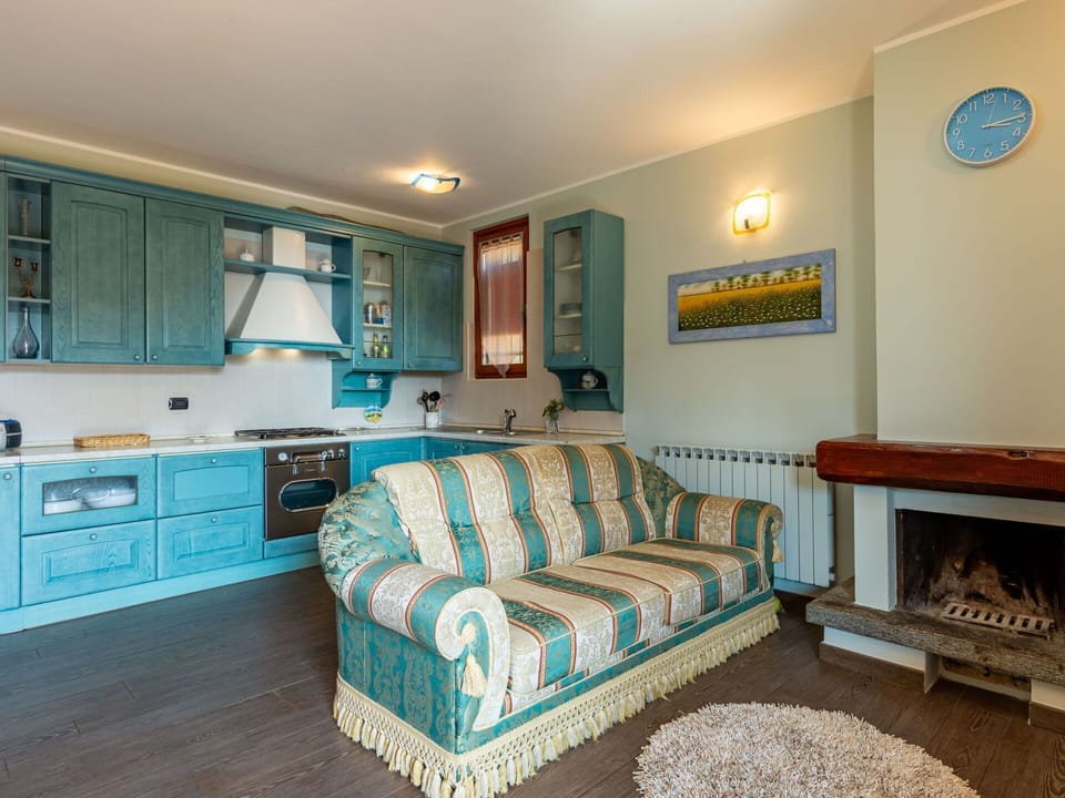 Furniture, Cabinetry, Couch, Azure, Picture Frame, Living Room, Wood, Comfort, Interior Design, Floor