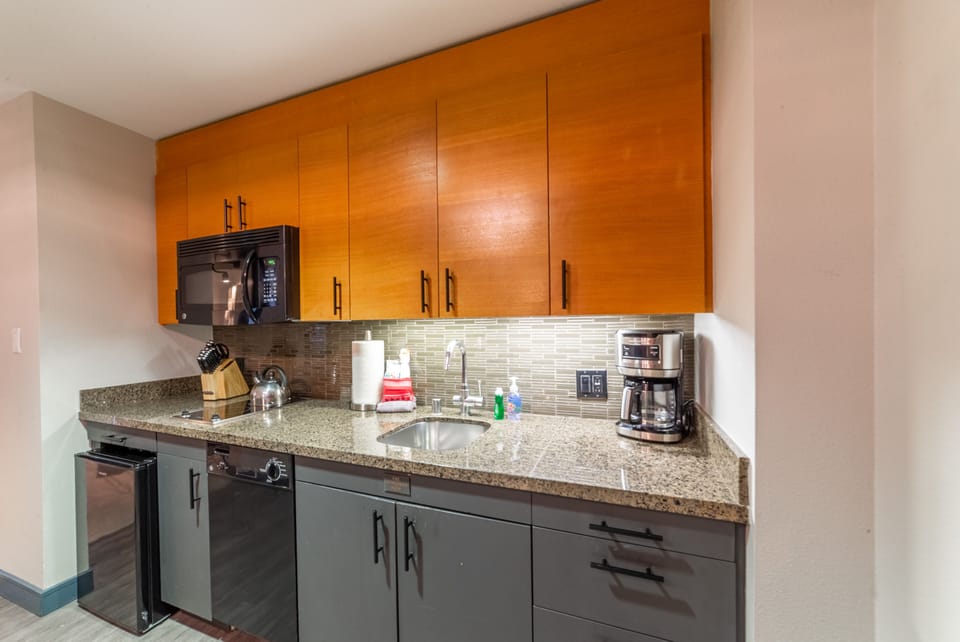 Kitchen comes fully stocked with everything needed to make simple meals.