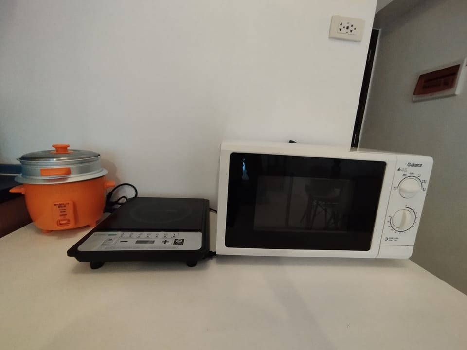 Fridge, stovetop, rice cooker, cookware/dishes/utensils