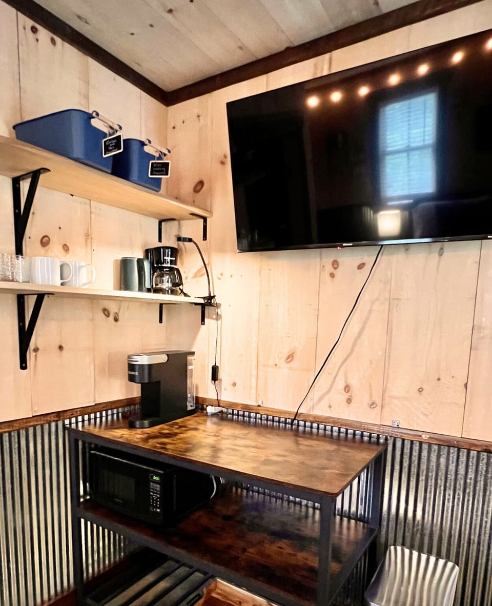 Microwave, Keurig + pods, reg coffee drip, coffee, cream & sugar. Smart TV