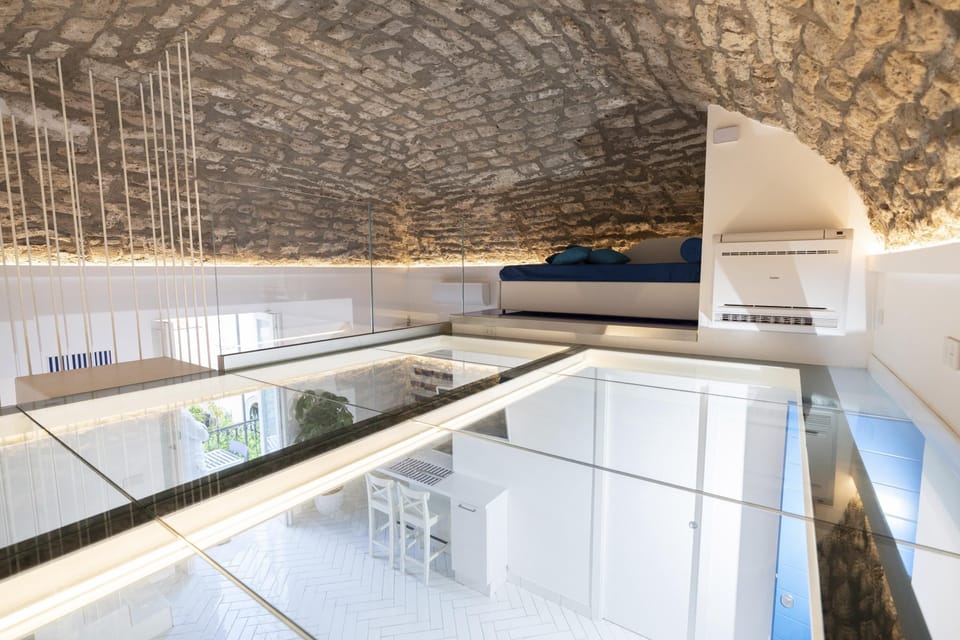 Deluxe Duplex | Premium bedding, down comforters, in-room safe, individually decorated