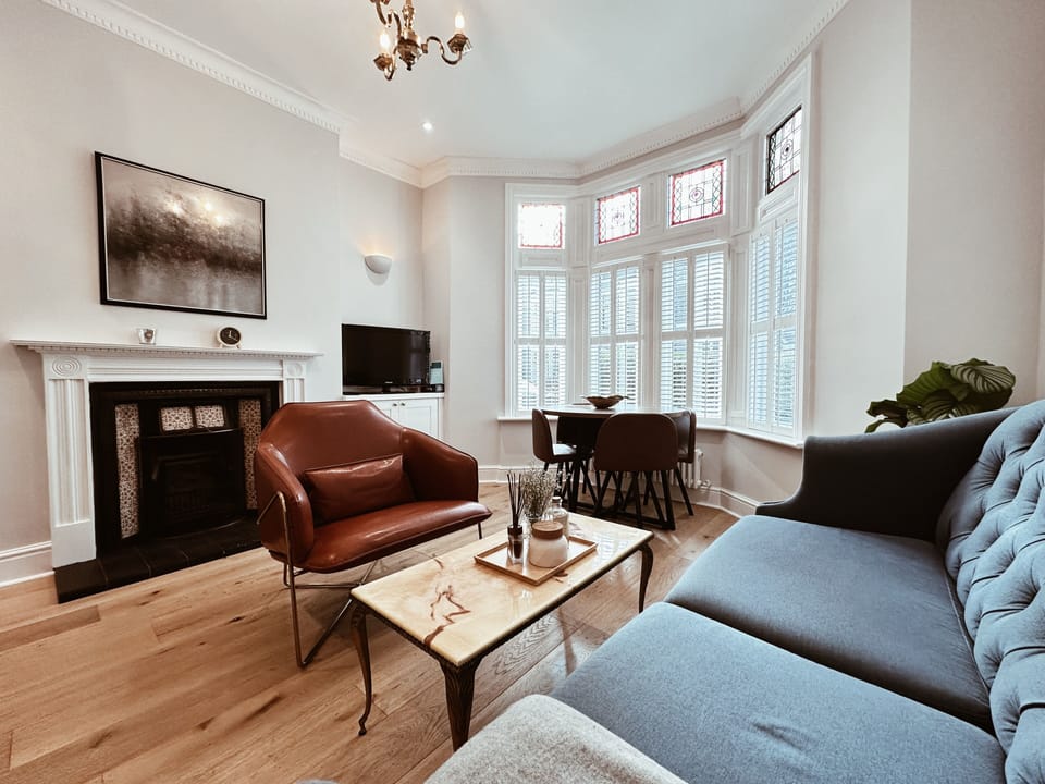 Luxury Apartment, 2 Bedrooms | Living area | 55-inch flat-screen TV with digital channels, fireplace