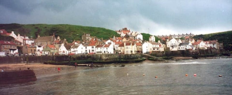 Ash Cottage snuggles in this historic harbourscape. Can you spot us?