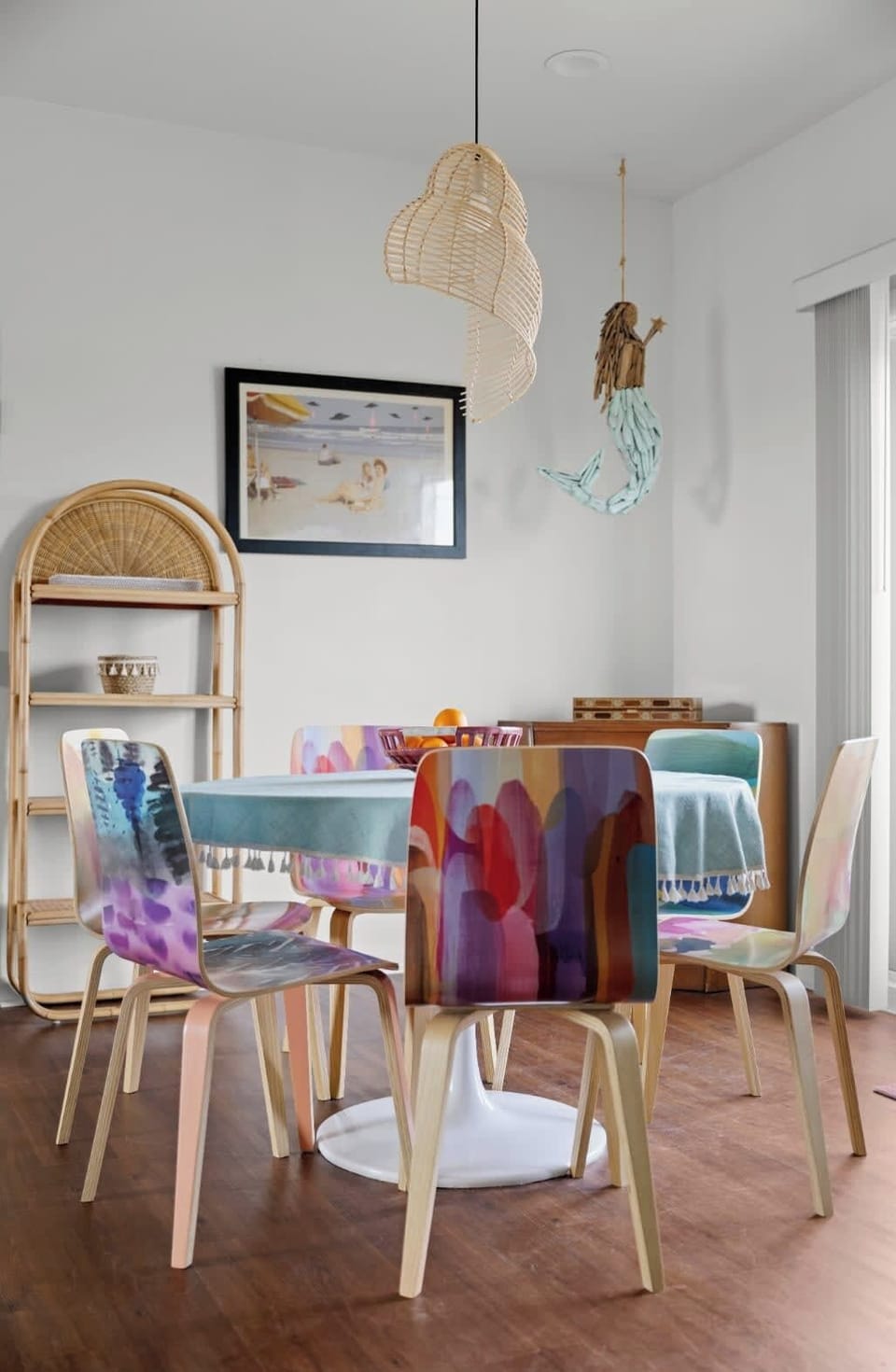 Dining Area — Colorful Abstract Chairs, Mermaid Decor & Rattan Pendant