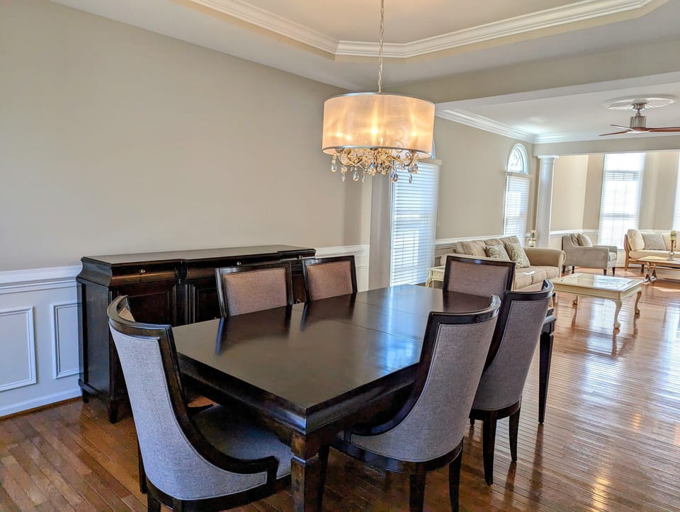38353 Virginia Drive - Bethany Lakes - dining space - A full view of the dining room highlighting the ample space for large dinner parties, complemented by high-end finishes and plenty of natural light.