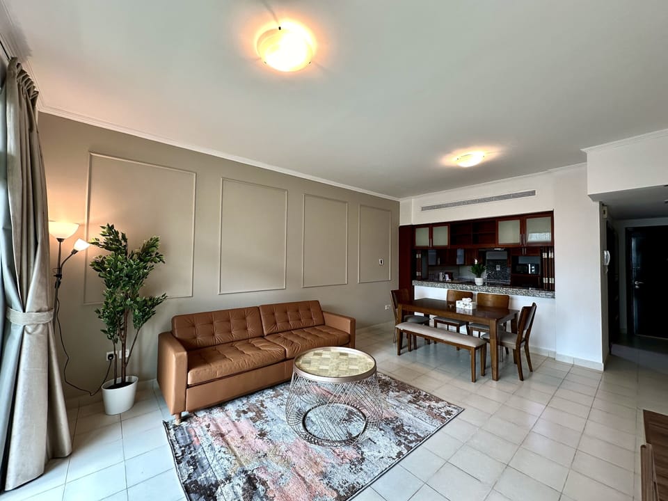 Panoramic Apartment | Living area | 60-inch Smart TV with digital channels, Netflix, streaming services