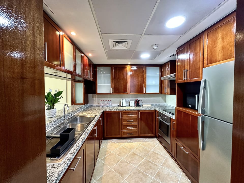 Panoramic Apartment | Private kitchen | Full-size fridge, microwave, oven, stovetop