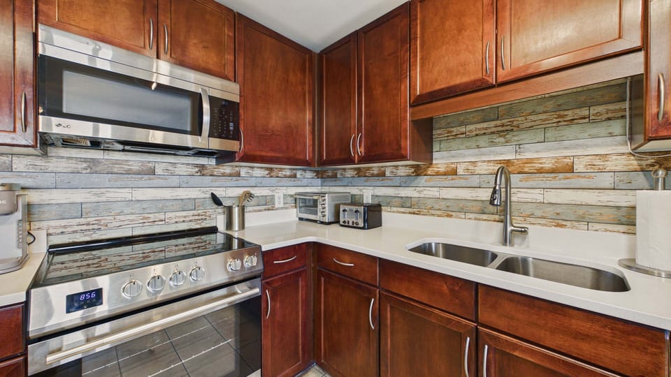Full kitchen with updated applianced and coffee essentials