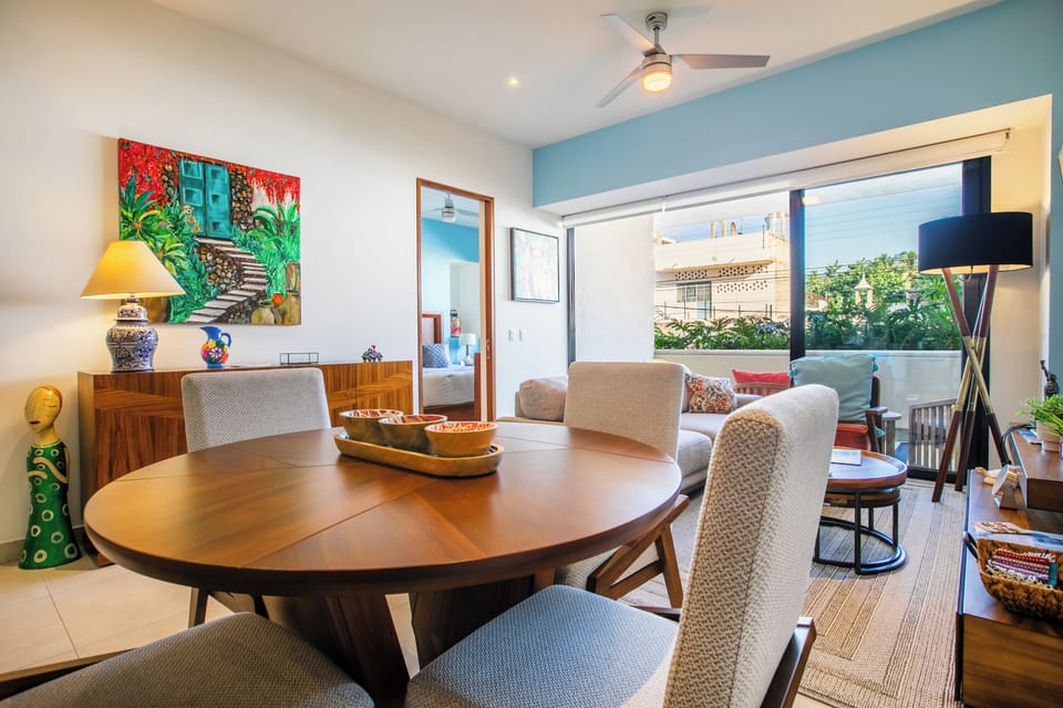 The dining table includes a seating for 4