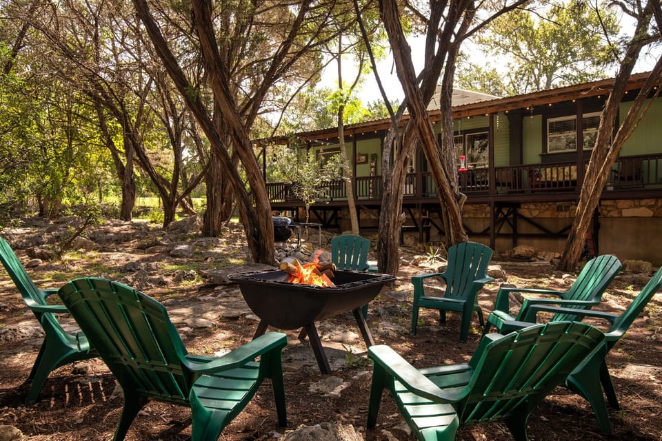 Fire pit/grill area for meal or to end the day with s'mores or just chilling.
