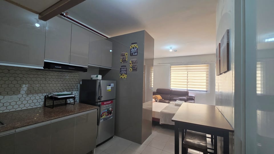 Full-size fridge, rice cooker, cookware/dishes/utensils