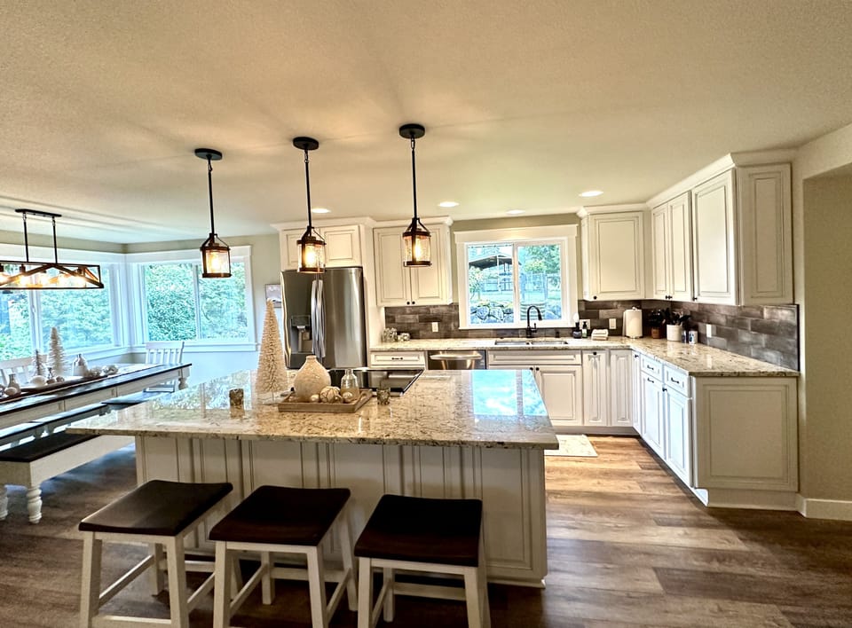 Island in Kitchen provides plenty of prep area plus stools to hangout!