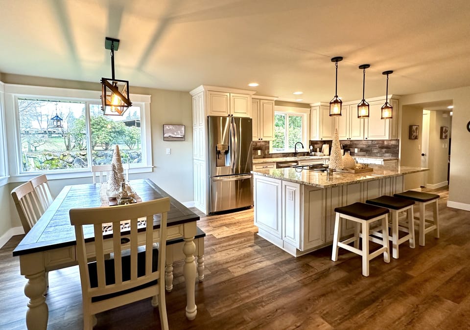 Entertaining & socializing are perfect in this spacious dining room & kitchen!