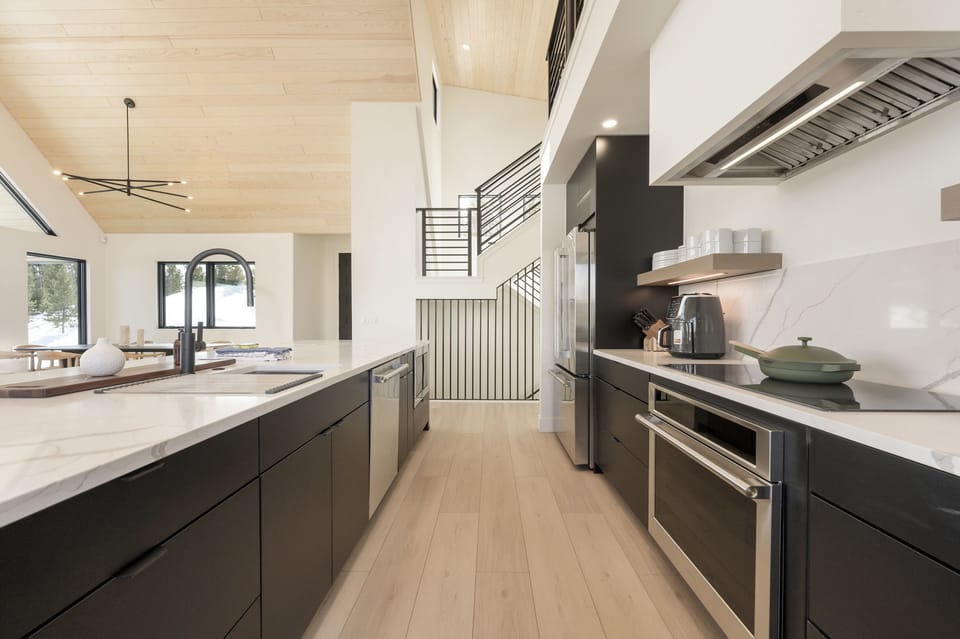Open Kitchen area with Dining Table and Living Space
