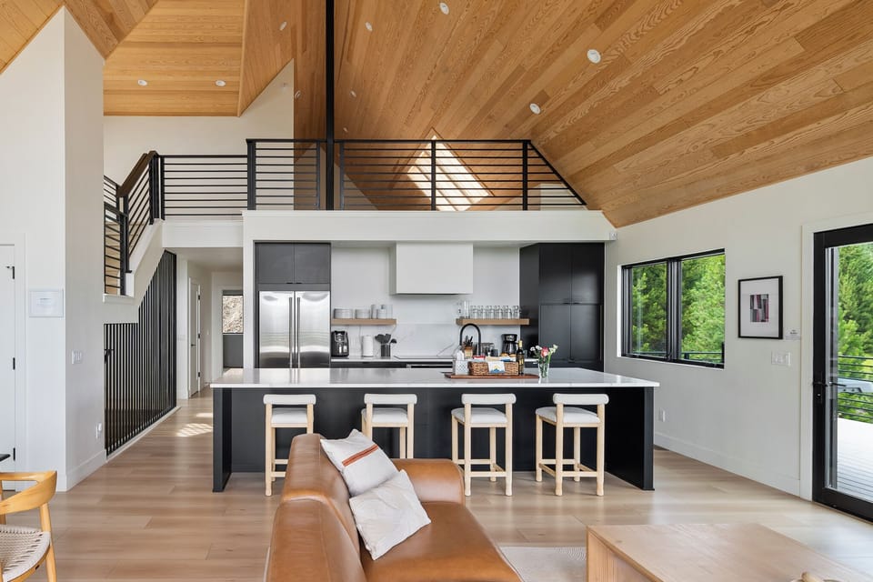 Open Kitchen and Living Room with Loft above
