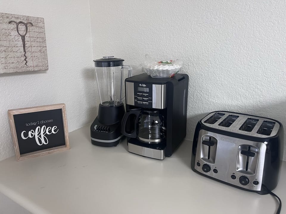 Coffee maker, blender and toaster are available for you to use.